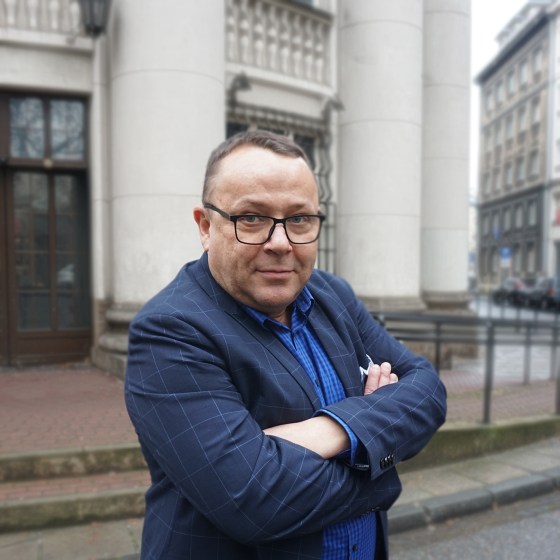 a man talking on a cell phone