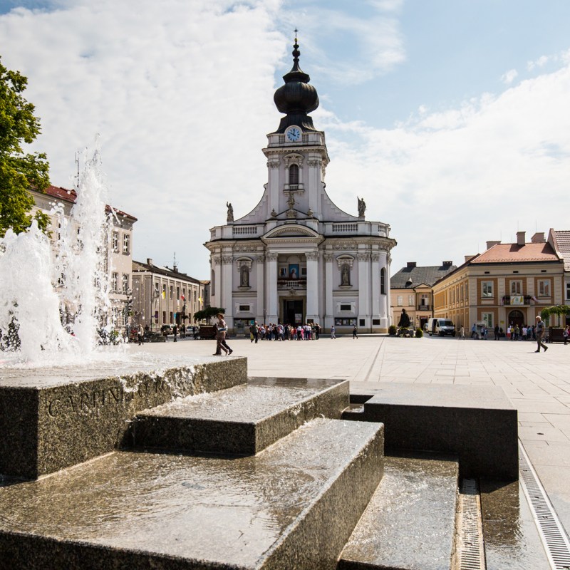 a fountain in front of a building
