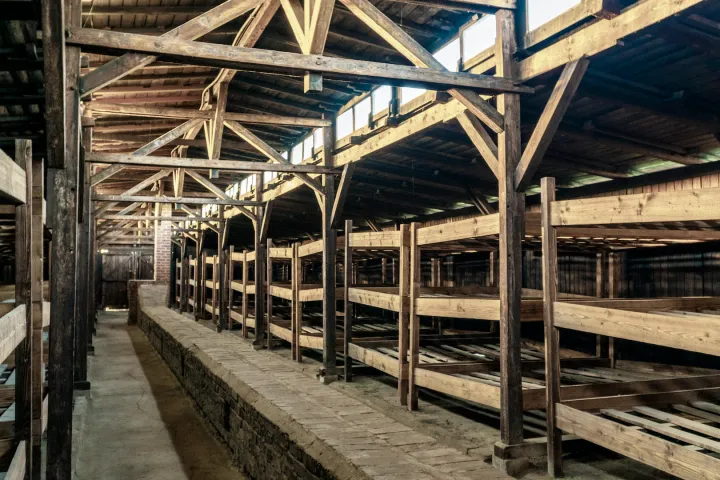 a large long train on a train track at a train station