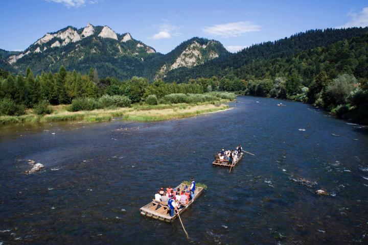 a body of water with a mountain in the background