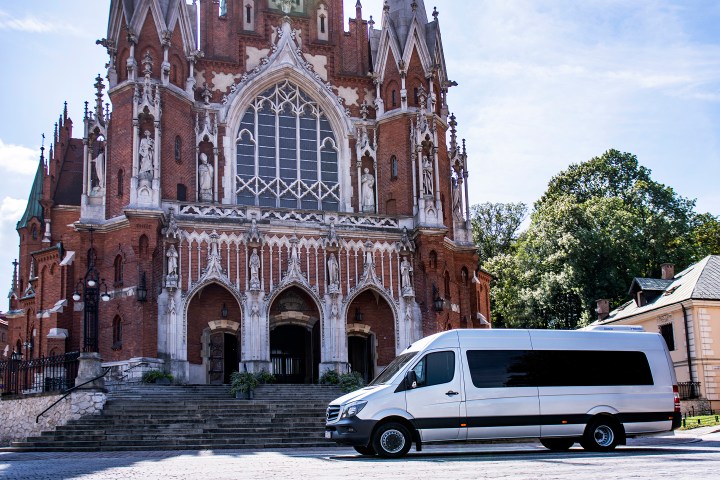 a car parked in front of a church