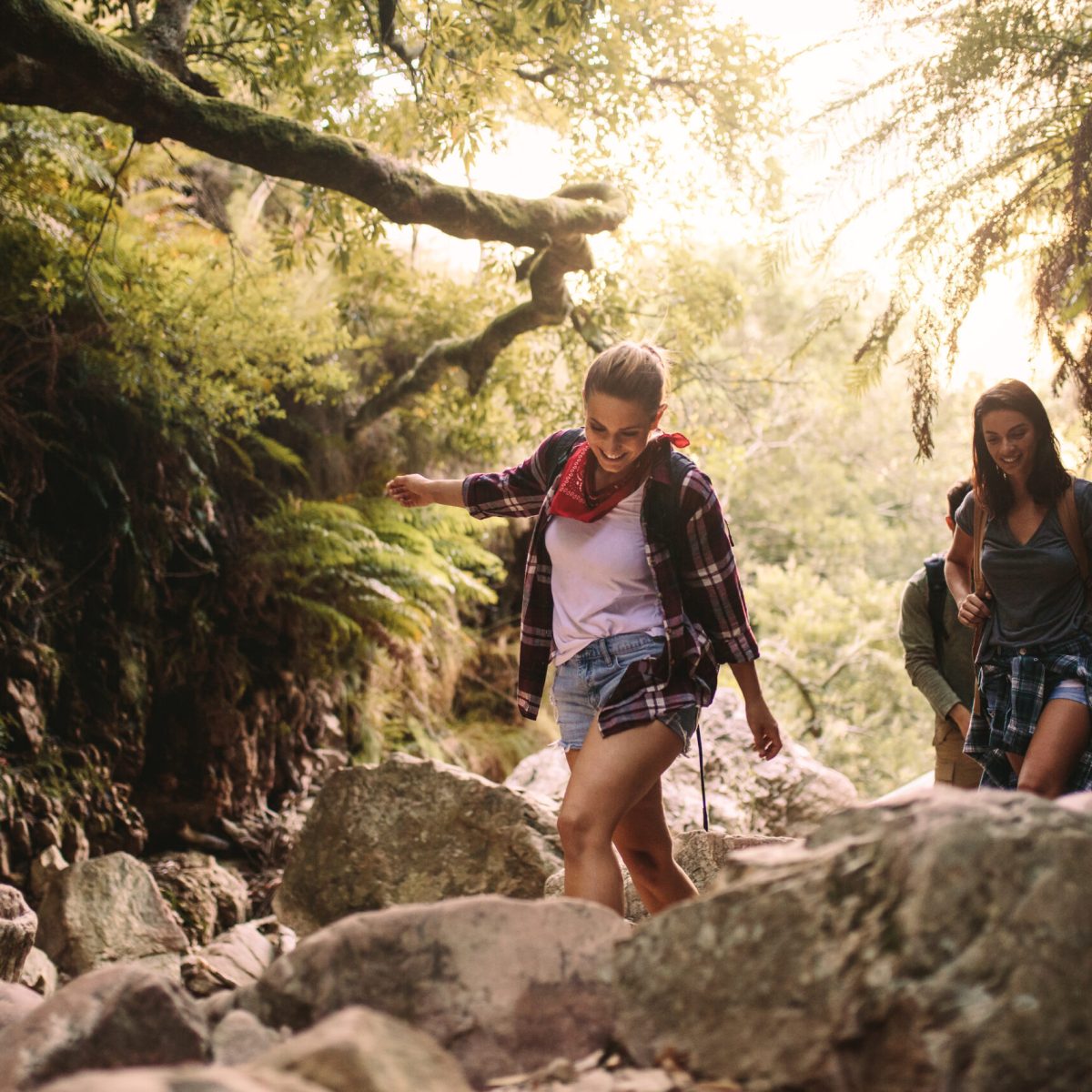 a person standing on a rock