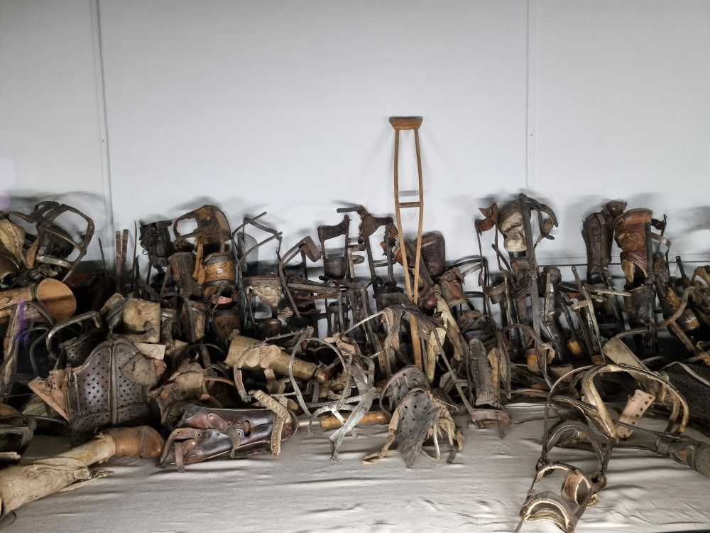 A collection of Auschwitz-Birkenau Museum prisoners' prosthetics and crutches exhibits